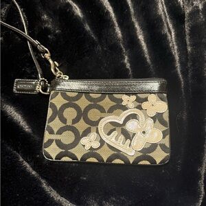 Coach Black and Tan Signature Clutch